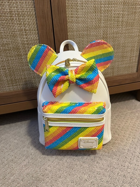 Loungefly Handbags - Loungefly White Mini Backpack with Rainbow Sequin Ears and Bow
